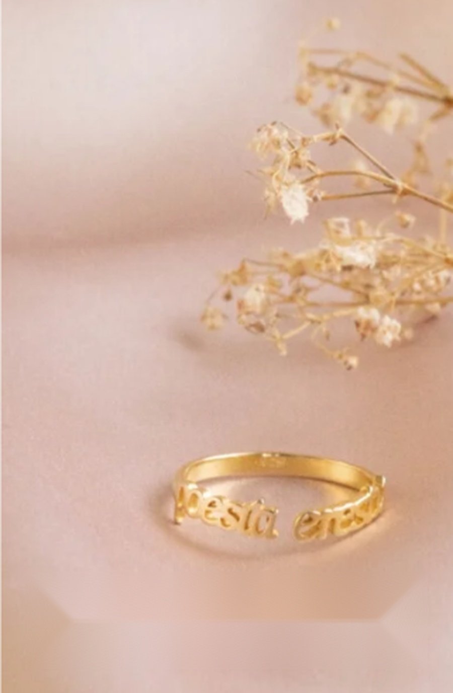 Gold birthday ring with dried flowers
